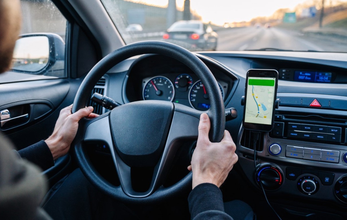 Person driving hands free